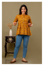 Yellow Printed Cotton Peplum Top for Women – Stylish & Comfortable Fit
