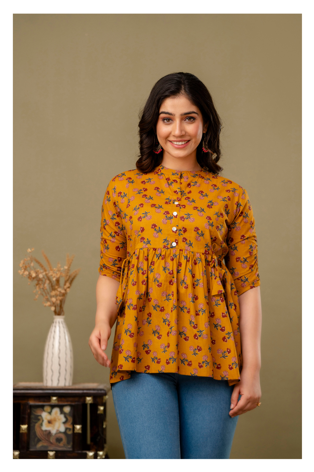 Yellow Printed Cotton Peplum Top for Women – Stylish & Comfortable Fit