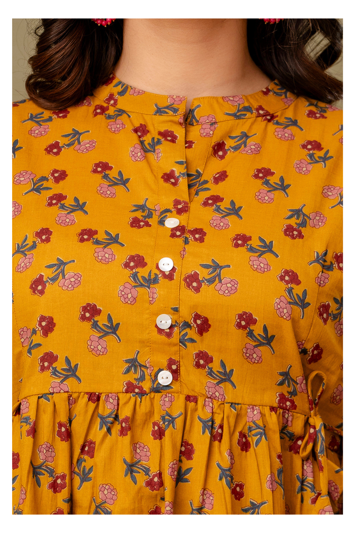 Yellow Printed Cotton Peplum Top for Women – Stylish & Comfortable Fit