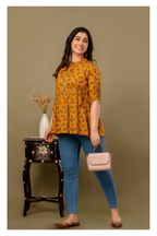 Yellow Printed Cotton Peplum Top for Women – Stylish & Comfortable Fit