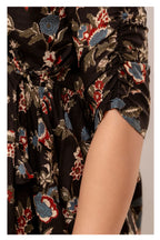 Women’s Black Floral Printed Peplum Top with Button Placket