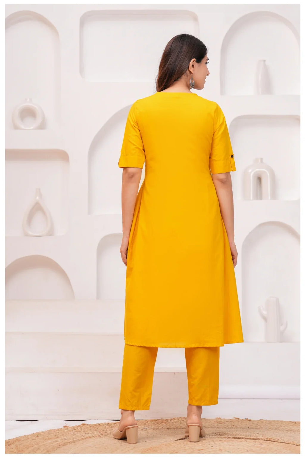 Solid mustard yellow kurti with subtle handcrafted detailing