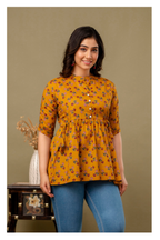 Yellow Printed Cotton Peplum Top for Women – Stylish & Comfortable Fit